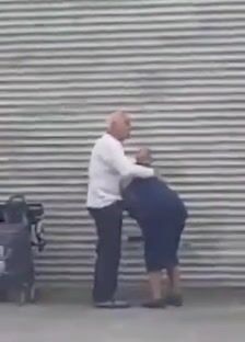 Hot Grandma caught giving a blowjob to grandpa in public