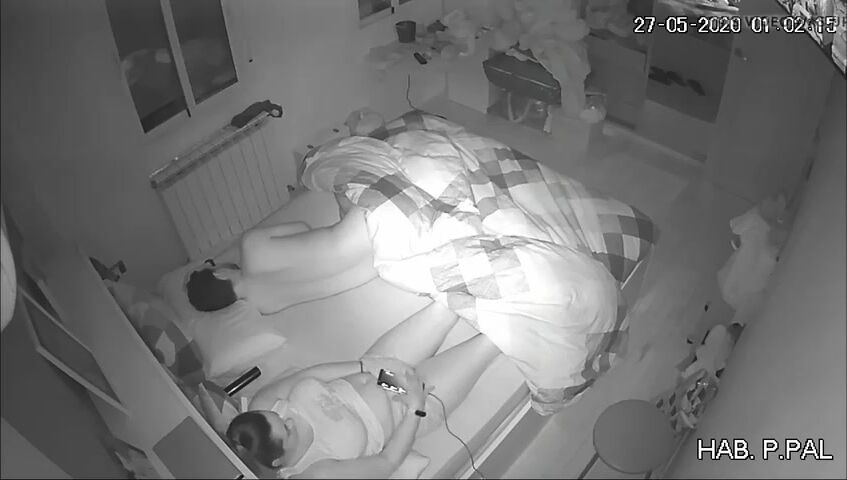 Real mother and son in the same bed, hidden camera caught her masturbating while he sleeps