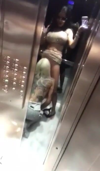 Sexy whores licking each other in the elevator
