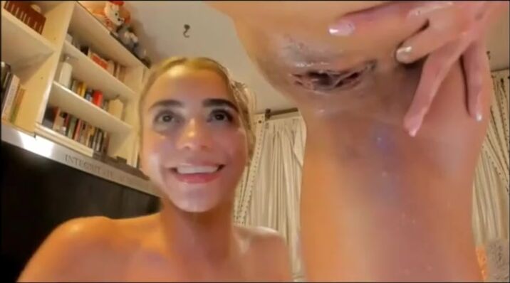 Twin sisters kissing and licking each other's pussy