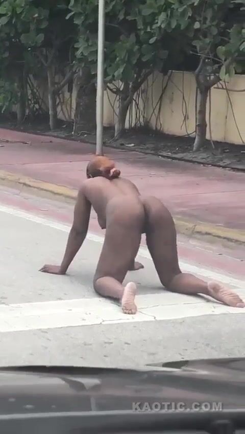 Ebony Woman having sex with invisible devil on the road